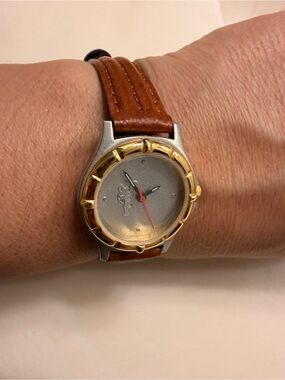 Brown Leather-Strap Watch with Gold-Bezel Accent need battery